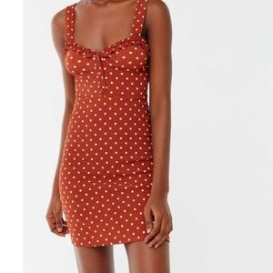 Burnt orange polka dot mini dress